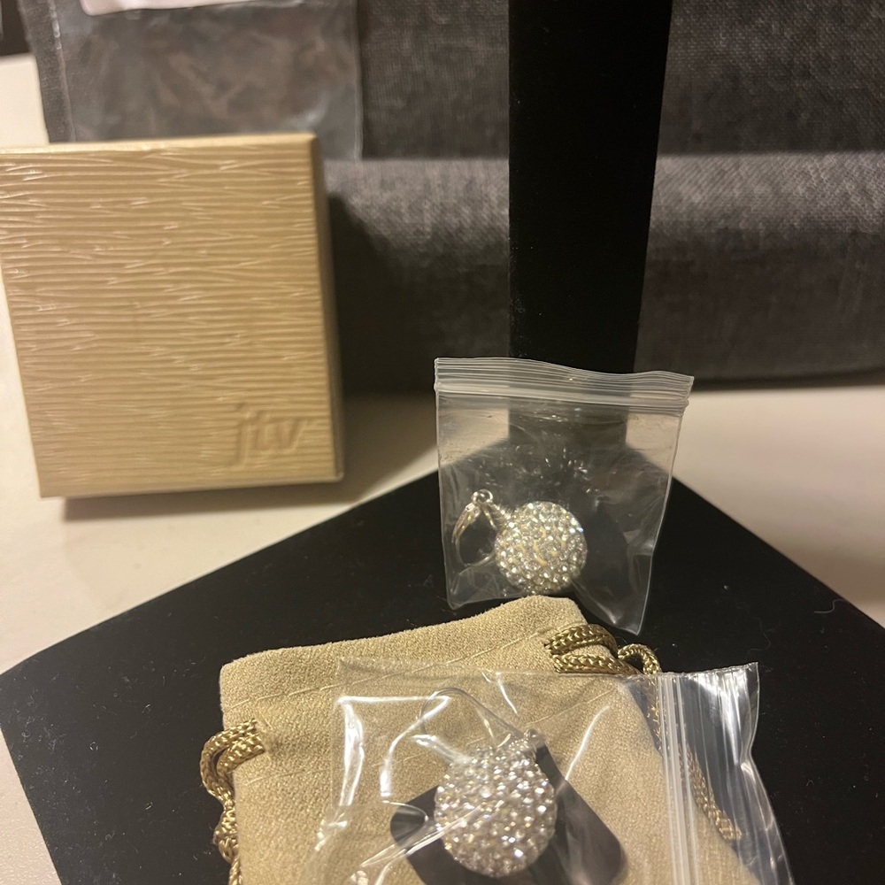 Sparkling earrings by JVT brand new and bag and inbox. Qvc